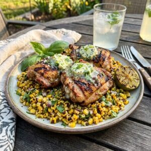 Grilled Chicken Thighs with Grilled Olathe Corn and Lime Basil Butter